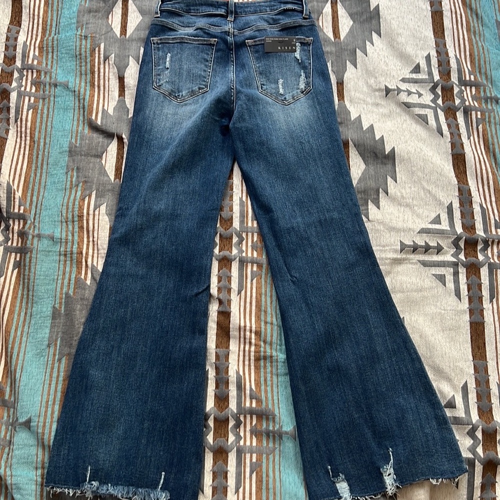 Risen raw hem mid rise flare jeans 9/29